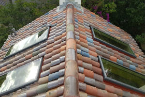 Skyspan Custom Flashings used to install Velux FCM onto Spanish Terracotta Roof Tiles